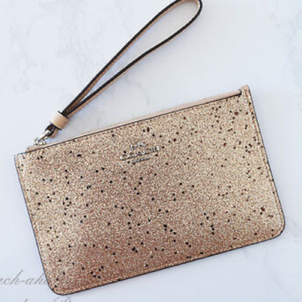 NWB Coach gold glitter star wristlet with gift box